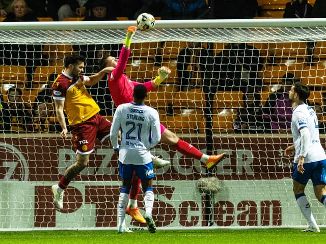 Rangers goalkeeper Jack Butland punches the ball into his own net but the goal was ruled out for a push from Motherwell's Tony Watt. (Photo by Craig Foy / SNS Group)