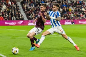Kilmarnock's Daniel Armstrong challenges Hearts' James Penrice during the match at Tynecastle in October.  (Photo by Mark Scates / SNS Group)