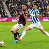 Kilmarnock's Daniel Armstrong challenges Hearts' James Penrice during the match at Tynecastle in October.  (Photo by Mark Scates / SNS Group)