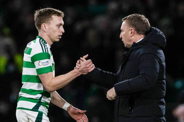 Celtic right-back Alistair Johnston shakes the hand of manager Brendan Rodgers after the 4-0 win over St Johnstone on Sunday. (Photo by Craig Williamson / SNS Group)