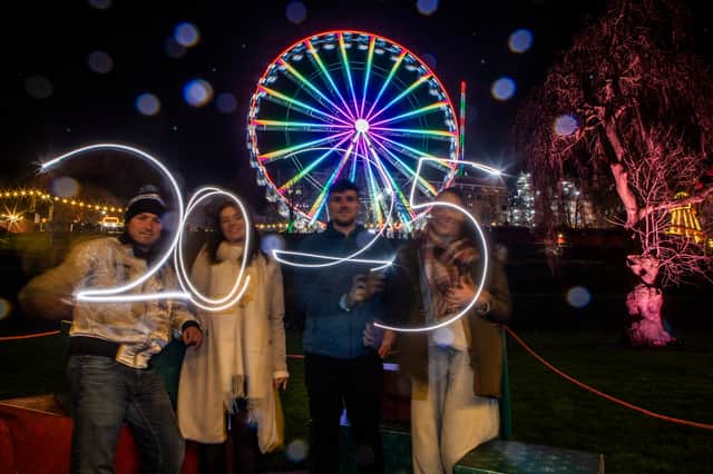 Some revellers braved the wind and rain in Edinburgh city centre on Hogmanay. 