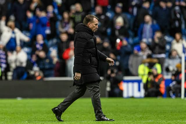 Celtic manager Brendan Rodgers walks off the pitch after the 3-0 defeat.