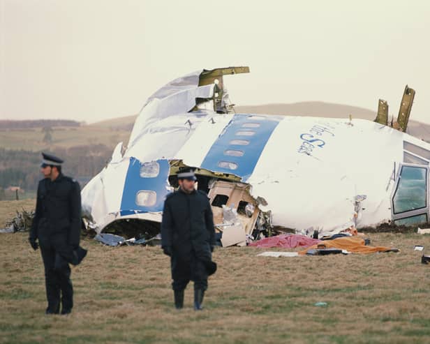 Police guard the nose section of Pan Am flight 103, which was blown up over Lockerbie, on December 21, 1988 (Picture: Bryn Colton)