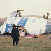 Police guard the nose section of Pan Am flight 103, which was blown up over Lockerbie, on December 21, 1988 (Picture: Bryn Colton)