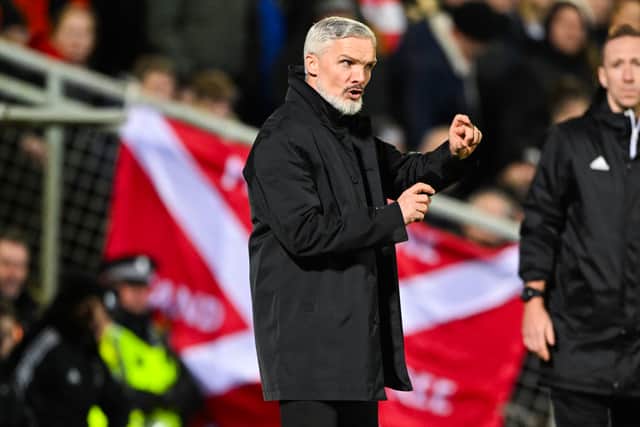A bottle of vodka has launched in the direction of Dundee United manager Jim Goodwin by Aberdeen fans at Tannadice last week. (Photo by Paul Devlin / SNS Group)