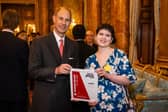 The Duke of Edinburgh with Rosa Ross, Boundary Breaker of the Year award during the Duke of Edinburgh's Award afternoon tea at Buckingham Palace