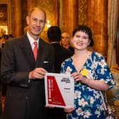 The Duke of Edinburgh with Rosa Ross, Boundary Breaker of the Year award during the Duke of Edinburgh's Award afternoon tea at Buckingham Palace