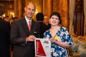 The Duke of Edinburgh with Rosa Ross, Boundary Breaker of the Year award during the Duke of Edinburgh's Award afternoon tea at Buckingham Palace