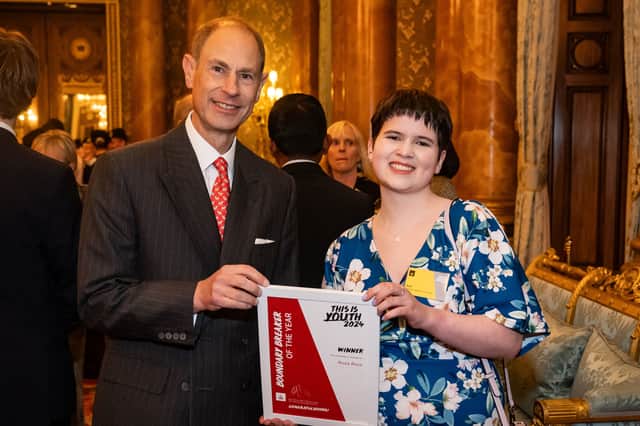 The Duke of Edinburgh with Rosa Ross, Boundary Breaker of the Year award during the Duke of Edinburgh's Award afternoon tea at Buckingham Palace