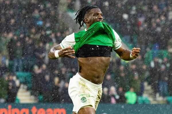 Hibernian's Rocky Bushiri celebrates scoring to make it 3-3 against Rangers at Easter Road. (Photo by Ross Parker / SNS Group)