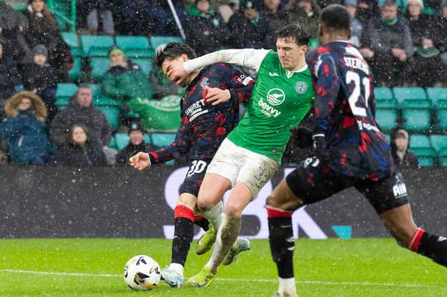 Hibs were awarded a penalty after Rangers forward Ianis Hagi clashed with Josh Campbell in the box.