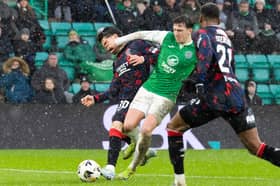 Hibs were awarded a penalty after Rangers forward Ianis Hagi clashed with Josh Campbell in the box.