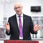 First Minister John Swinney is appealing for opposition MSPs to back the Scottish Government's draft budget