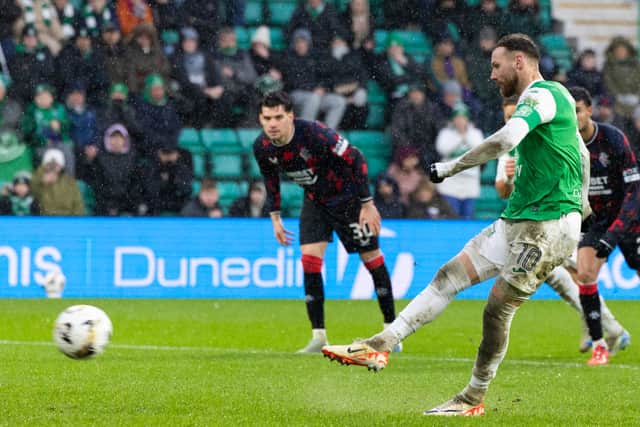 Hibs forward Martin Boyle scores a penalty to make it 2-2 against Rangers at Easter Road. (Photo by Ross Parker / SNS Group)