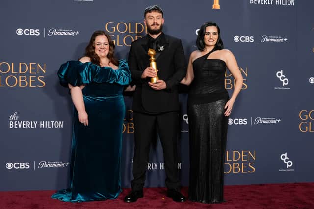  Jessica Gunning, Richard Gadd, and Nava Mau pose with the award for best television limited series made for television for "Baby Reindeer"  