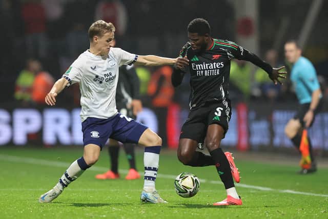 New Aberdeen loan signing Jeppe Okkels (left) of Preston North End challenges Arsenal's Thomas Partey during the Carabao Cup fourth round match at Deepdale on October 30, 2024. (Photo by Matt McNulty/Getty Images)