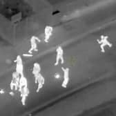 Helicopter footage from Police Scotland shows youths throwing fireworks and other projectiles during public disorder in Edinburgh last year