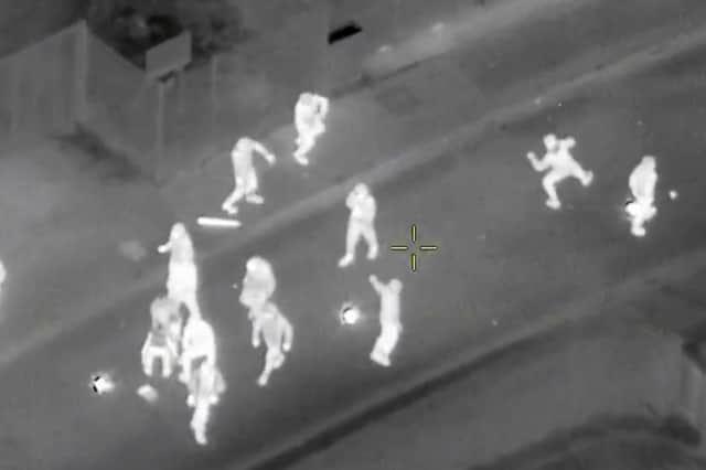 Helicopter footage from Police Scotland shows youths throwing fireworks and other projectiles during public disorder in Edinburgh last year