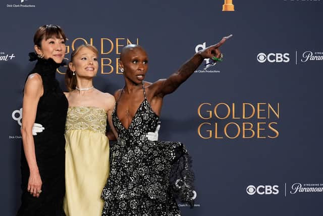 Michelle Yeoh, from left, Ariana Grande, and Cynthia Erivo pose in the press room during the 82nd Golden Globes on Sunday. Picture: AP Photo/Chris Pizzello