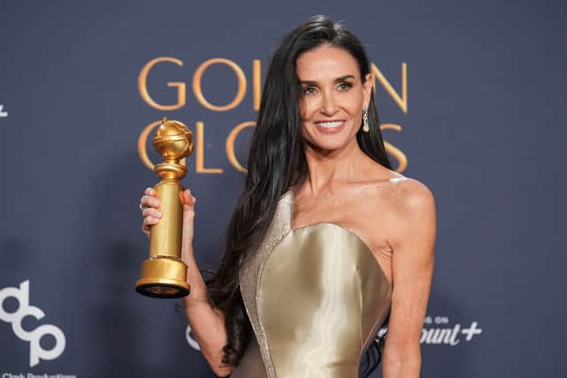 Demi Moore poses in the press room with the award for best performance by a female actor in a motion picture - musical or comedy for The Substance during the 82nd Golden Globes on Sunday. Picture: AP Photo/Chris Pizzello