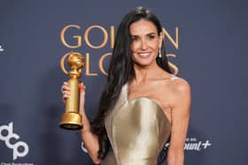 Demi Moore poses in the press room with the award for best performance by a female actor in a motion picture - musical or comedy for The Substance during the 82nd Golden Globes on Sunday. Picture: AP Photo/Chris Pizzello