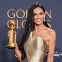 Demi Moore poses in the press room with the award for best performance by a female actor in a motion picture - musical or comedy for The Substance during the 82nd Golden Globes on Sunday. Picture: AP Photo/Chris Pizzello