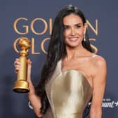 Demi Moore poses in the press room with the award for best performance by a female actor in a motion picture - musical or comedy for The Substance during the 82nd Golden Globes on Sunday. Picture: AP Photo/Chris Pizzello