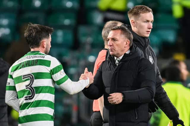 Celtic manager Brendan Rodgers and Greg Taylor after the win over St Mirren.