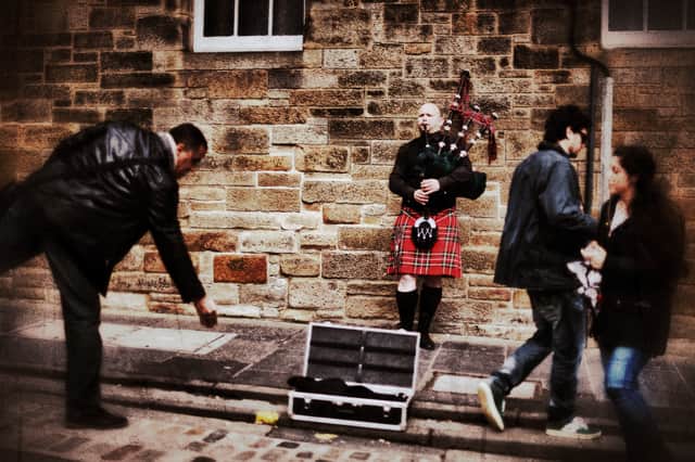 A piper plays on the Royal Mile in Edinburgh. It just would not be the same with a kazoo (Picture: Jeff J Mitchell)