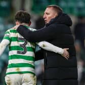 Celtic manager Brendan Rodgers and Greg Taylor at full time after the 2-0 win over Dundee United. (Photo by Craig Williamson / SNS Group)