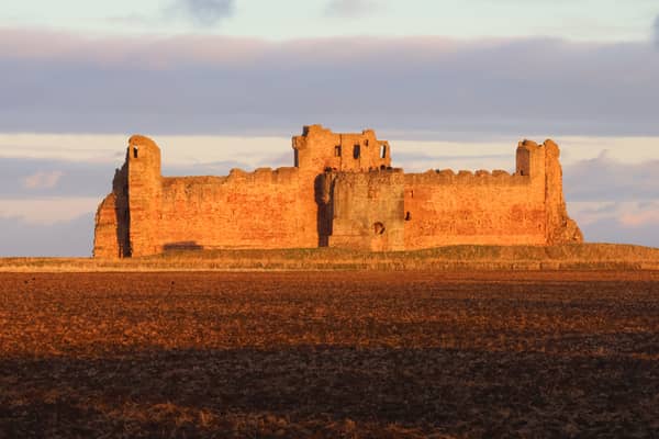 East Lothian's Tantallon Castle glows in the "Golden Hour" before sunset 