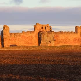 East Lothian's Tantallon Castle glows in the "Golden Hour" before sunset 