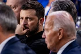 US President Joe Biden's failure to provide Ukraine's Volodymyr Zelensky with vital military equipment like Himars missiles, advanced tanks and warplanes quickly enough has seen the conflict drag on for too long, testing American taxpayers' patience (Picture: Samuel Corum)