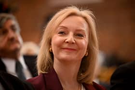 Former British Prime Minister Liz Truss attends the 'Popular Conservatives' conference, presumably unaware of the irony