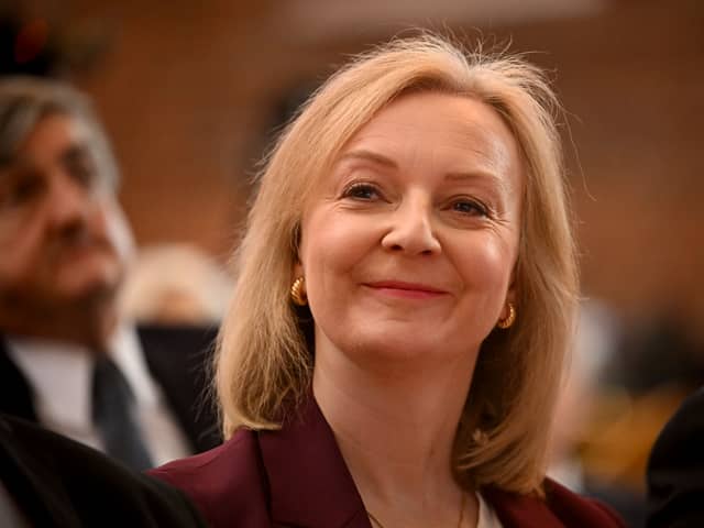 Former British Prime Minister Liz Truss attends the 'Popular Conservatives' conference, presumably unaware of the irony