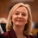 Former British Prime Minister Liz Truss attends the 'Popular Conservatives' conference, presumably unaware of the irony