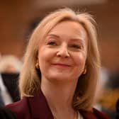 Former British Prime Minister Liz Truss attends the 'Popular Conservatives' conference, presumably unaware of the irony