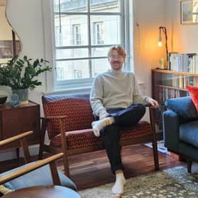 Matt McCallum has upcycled an old Glasgow subway seat into his living room sofa.