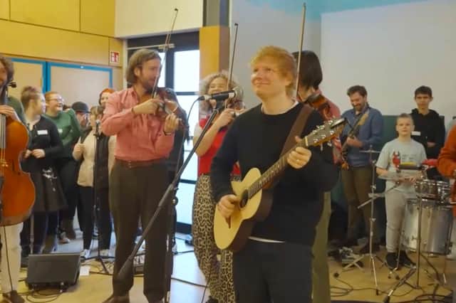 Ed Sheeran paid a surprise visit to Muirhouse Library and West Pilton Neighbourhood Centre in North Edinburgh to launch a new music education campaign.