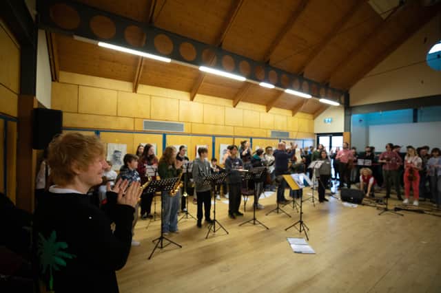 Ed Sheeran paid a surprise visit to Muirhouse Library and West Pilton Neighbourhood Centre in North Edinburgh to launch a new music education campaign.