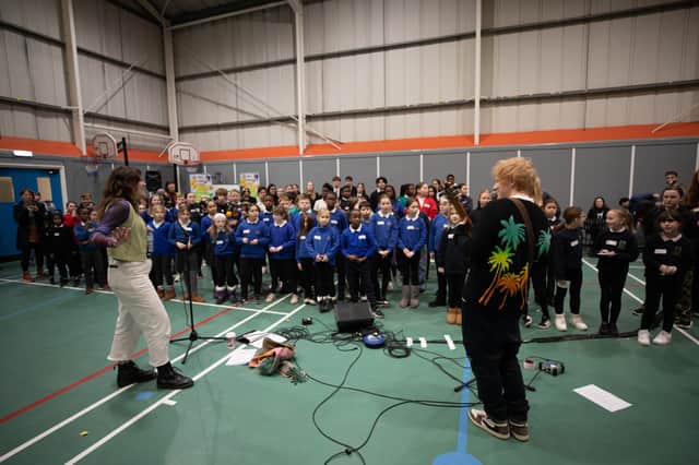 Ed Sheeran paid a surprise visit to Muirhouse Library and West Pilton Neighbourhood Centre in North Edinburgh to launch a new music education campaign.