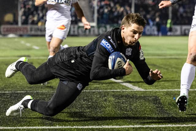 Warriors' Sebastian Cancelliere scores the third try of the match.