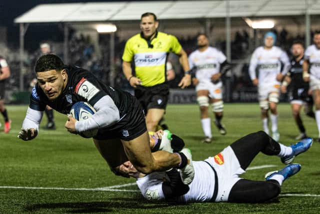 Glasgow Warriors' Sione Tuipulotu scores the fourth try of the match in the win over Racing 92.
