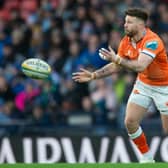 Edinburgh's Ali Price scored two first-half tries in the 29-25 win over Vannes in France.