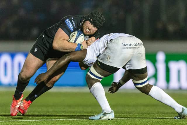 Glasgow Warriors' Zander Fagerson takes the ball into contact during the Investec Champions Cup match against Racing 92.