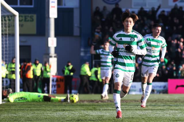 Celtic's Kyogo Furuhashi celebrates after scoring to make it 2-1 over Ross County. (Photo by Craig Williamson / SNS Group)