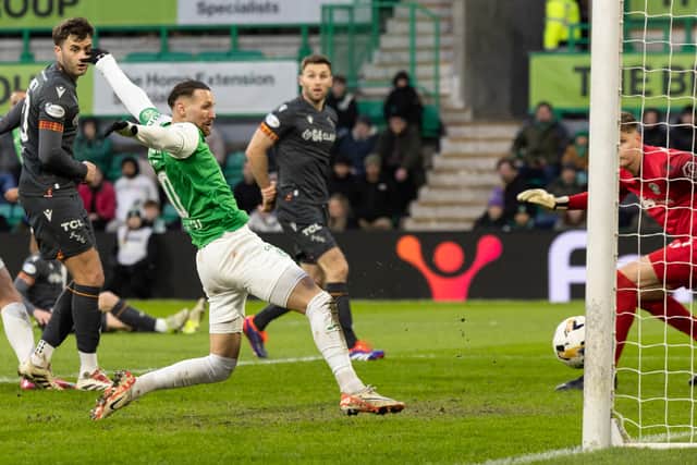 Martin Boyle opens the scoring for Hibs against Motherwell. (Photo by Ross Parker / SNS Group)