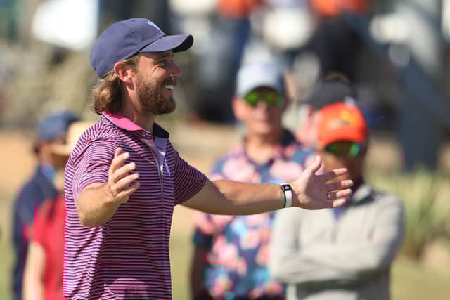 Tommy Fleetwood celebrates clinching victory for Great Britain & Ireland in the Team Cup at Abu Dhabi Golf Resort