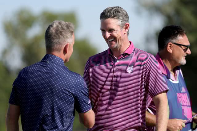Justin Rose is congratulated by European Ryder Cup captain Luke Donald after leading Great Britain and Ireland to victory in the Team Cup in Abu Dhabi