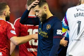 Hearts' Jorge Grant looks dejected after his penalty miss at Aberdeen.